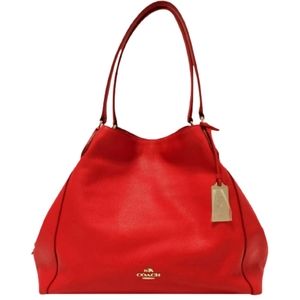 COACH Red Pebbled Leather shoulder bag with dust bag